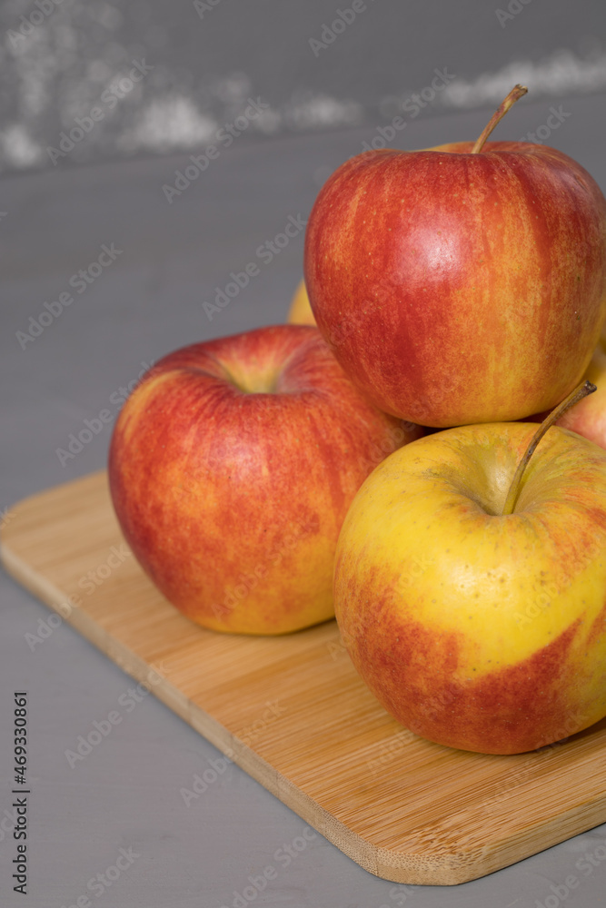 Fresh apple on a wooden desk