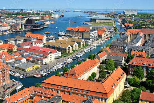 Panoramic View of Nyhavn Historical Pier Port, Buildings, Canal and Copenhagen Opera House. Aerial Picture of City in Denmark, Spring 2012.