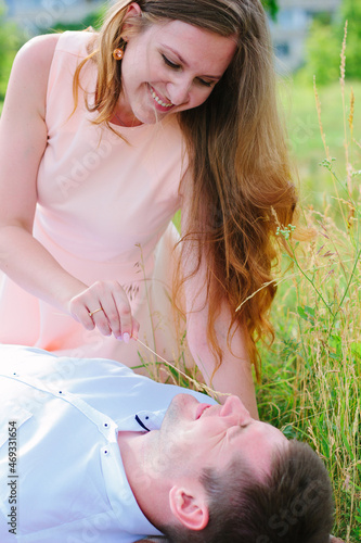 Girl and man couple laying ...