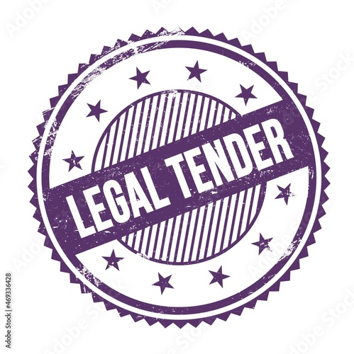Fotografie LEGAL TENDER text written on purple indigo grungy round stamp.
