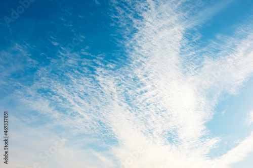 Cloudscape with altocumulus and altostratus clouds at sunny day.