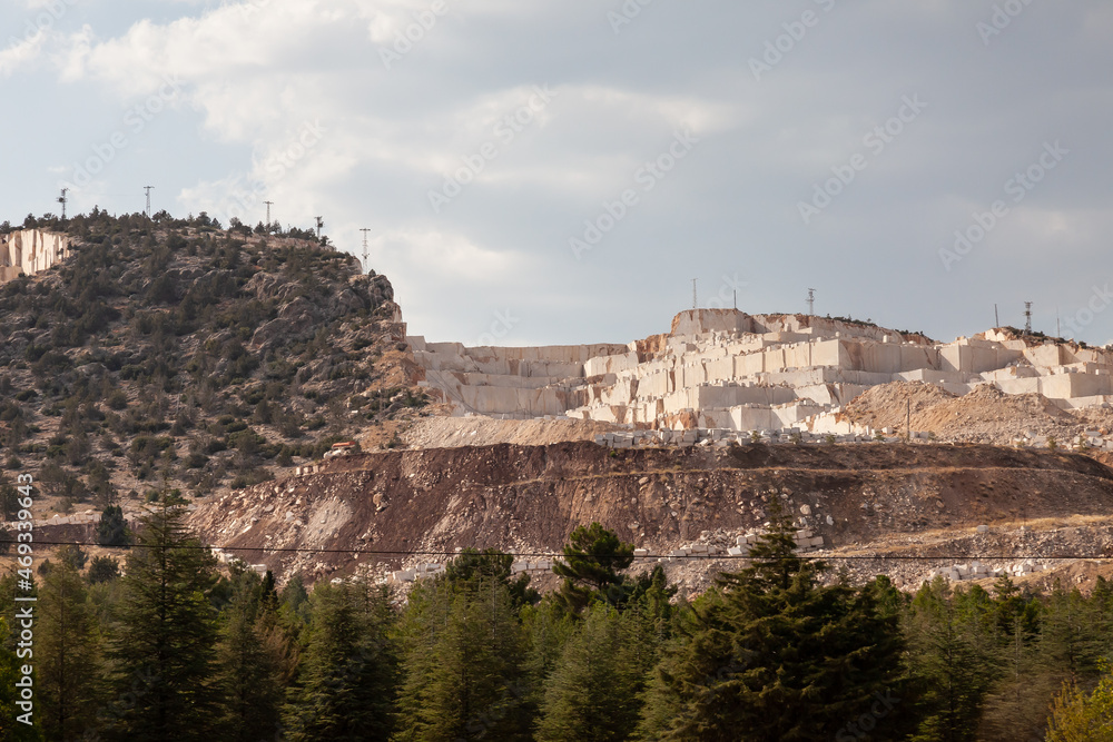 High stone mountain and marble quarries in Turkey. Open marble mining. Environment mining