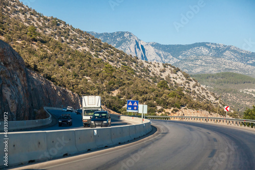 Highway in turkey among mountains and rocks while traveling on a hot summer day. Tourism and rest © Aleksandr Kondratov