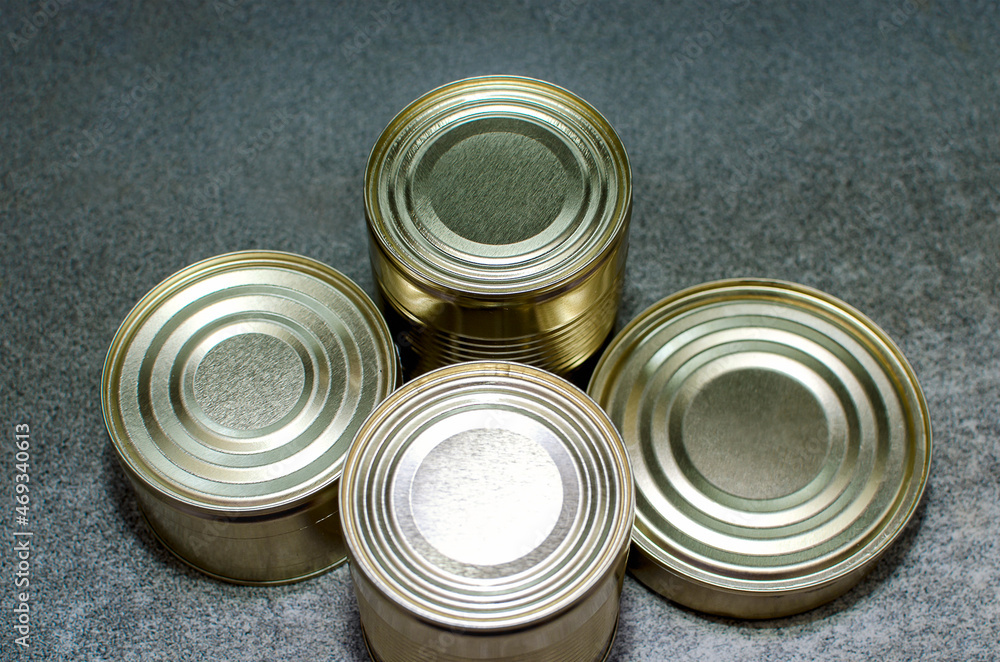 Tin cans on the kitchen table, closeup Tin cans on the kitchen table, closeup