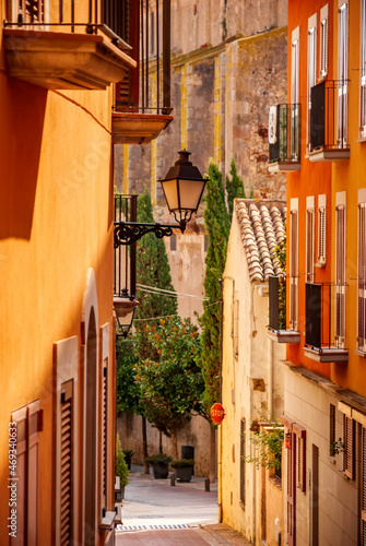 Cozy streets of Tossa De Mar, Catalonia, Spain. Picturesque little town near Barcelona. Famous tourist destination Costa Brava.