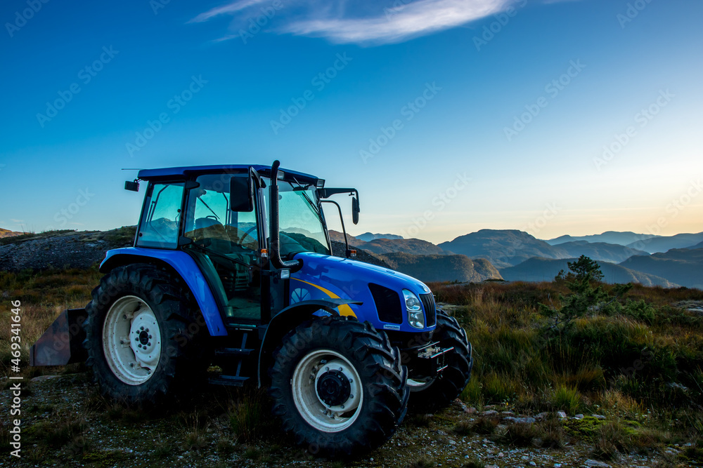 Fototapeta premium tractor on the field