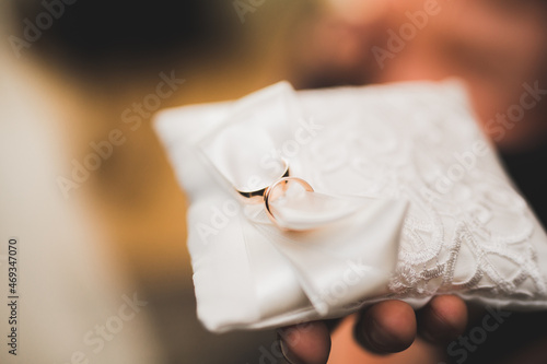 Wedding rings on ceremony at church. Macro.