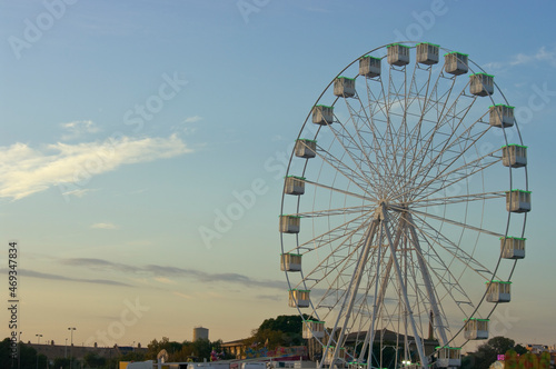 Sunset with the Ferris wheel at the fair.