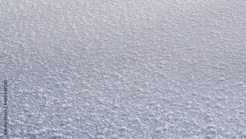 Texture of ice of frozen lake in sunlight Texture of ice of frozen lake in sunlight