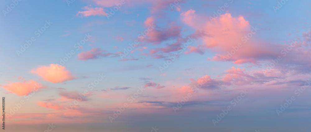 Pastel gentle pink clouds in the blue sky during dawn sunset, sundown backgroung Pastel gentle pink clouds in the blue sky during dawn sunset, sundown backgroung
