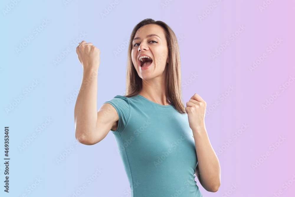 Young lady with positive expression, joyful and exciting, dressed in casual cloth Young lady with positive expression, joyful and exciting, dressed in casual cloth