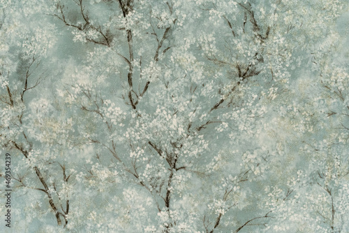 Photo of wallpaper with trees with white flowers. Background and texture with copy space