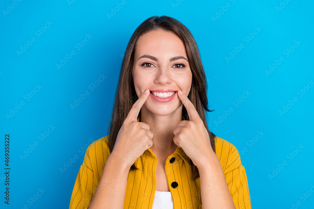 Fototapeta premium Photo of young pretty woman point fingers teeth dentist oral care stomatology isolated over blue color background