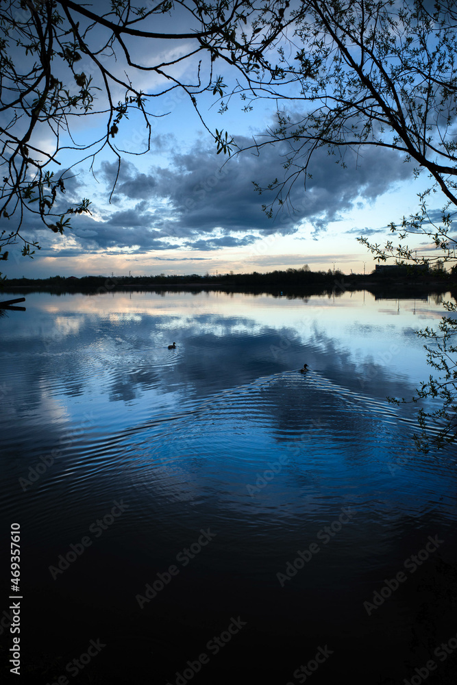 Beautiful reflection of the sky in the water of the river Beautiful reflection of the sky in the water of the river