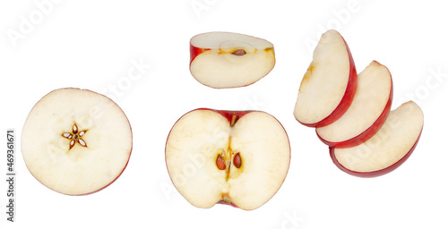 Red apple slices isolated on a white background, top view