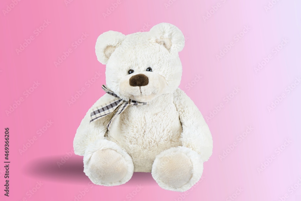Stuffed Ñute toy sitting on a colored background. Stuffed Ñute toy sitting on a colored background.