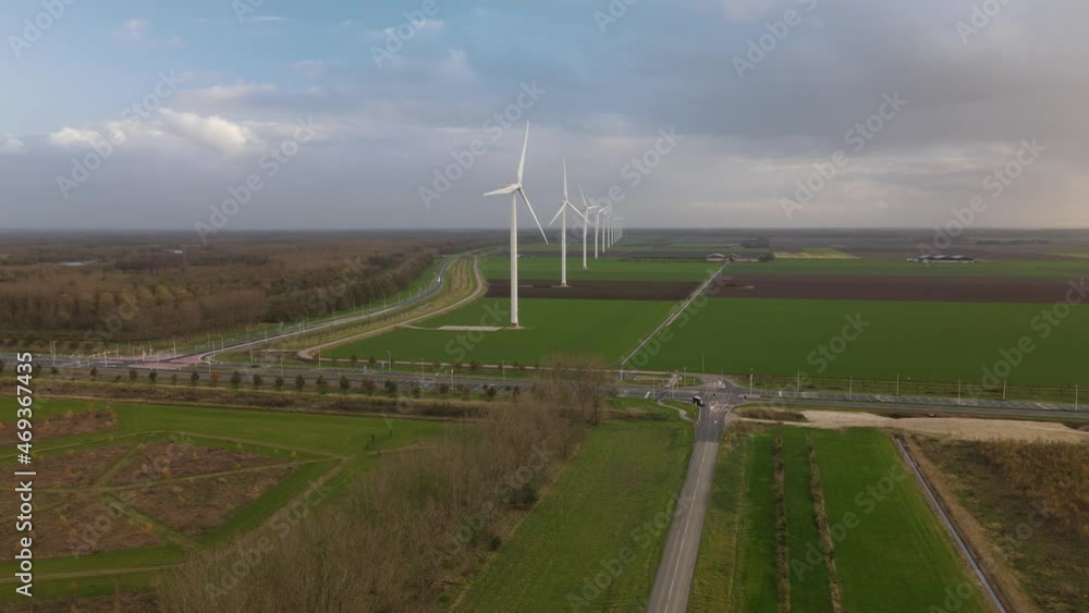 Wind turbines in open farm grass land near Zeewolde clean sustainable energy source. The Netherlands. Wind turbines in open farm grass land near Zeewolde clean sustainable energy source. The Netherlands.