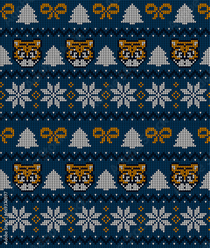 Knitted Christmas and New Year pattern in Tiger. Wool Knitting Sweater Design. Wallpaper wrapping paper textile print.
