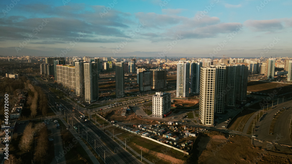 © f2014vad - Construction site. Construction of modern multi-storey buildings. Against the background of the blue sky. Aerial photography.