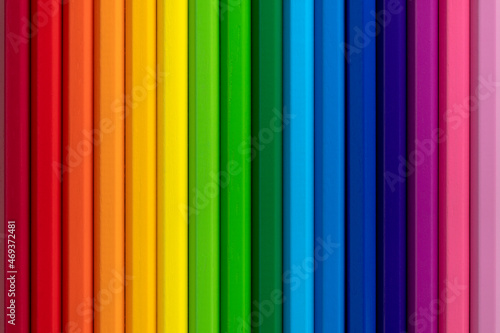 Rainbow background made of wooden colour pencils. Flat lay.