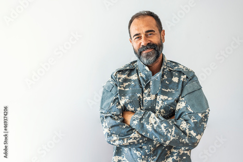 Handsome man in his United States military uniform; copy space. Happy Military Man. US Mature soldier portrait. Handsome African american male soldier in the uniform of US forces photo