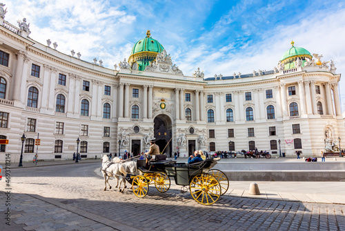 Hofburg palace on St. Michael square (Michaelerplatz), Vienna, Austria photo