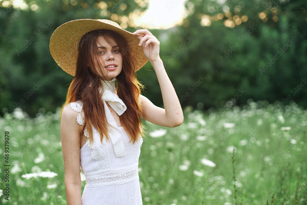 pretty woman in hat walk nature posing fashion