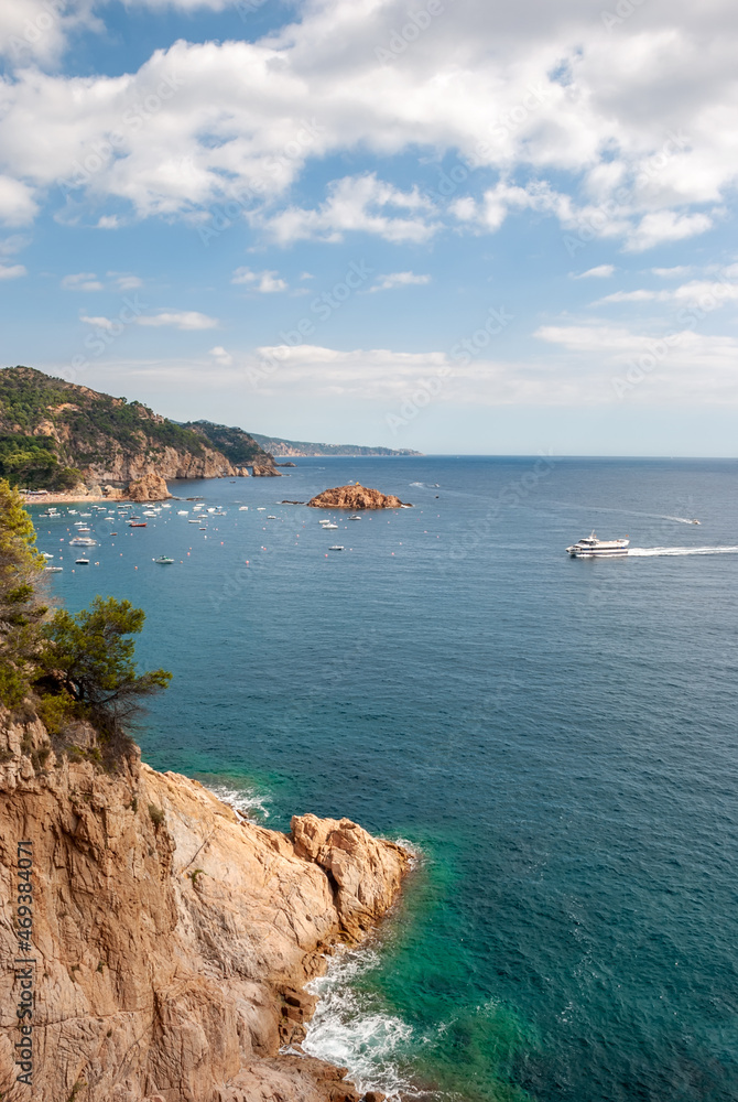 Tossa De Mar, Catalonia, Spain. Picturesque Costa Brava coast with beautiful beaches and clean turquoise water. Tossa De Mar, Catalonia, Spain. Picturesque Costa Brava coast with beautiful beaches and clean turquoise water.