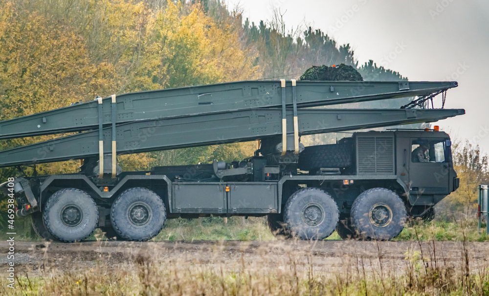 Fototapeta premium British army Alvis unipower 8x8 tank bridge transporter in action on a military exercise, Salisbury Plain, UK