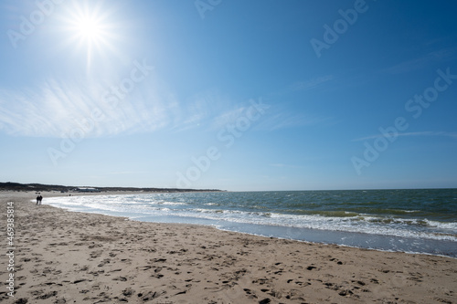 View on wide white sandy North sea beach in Renesse  Zeeland  Netherlands