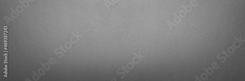 Gray textured paper background. Panorama texture gray cardboard seamless pattern. Large format photo for print or banner. For your project or design.