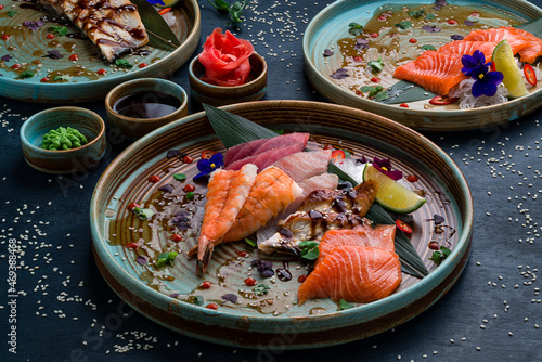 Obraz na plátně Sashimi set, Japanese food sashimi a traditional dish of raw fish served on the