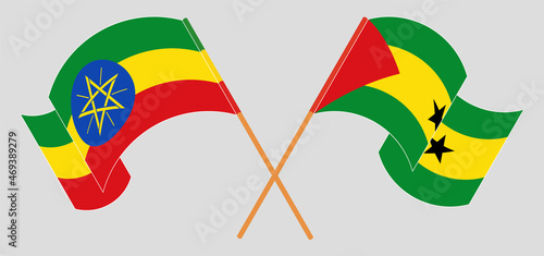 Crossed and waving flags of Ethiopia and Sao Tome and Principe