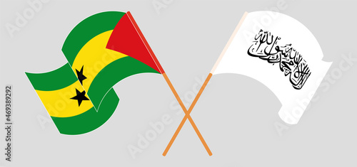 Crossed and waving flags of Sao Tome and Principe and Taliban