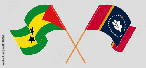 Crossed and waving flags of Sao Tome and Principe and The State of Mississippi