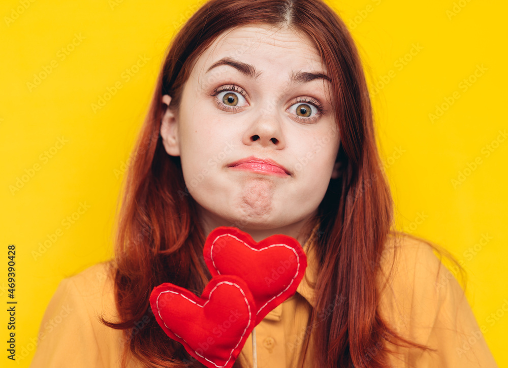 pretty woman heart on a stick emotions holiday yellow background pretty woman heart on a stick emotions holiday yellow background