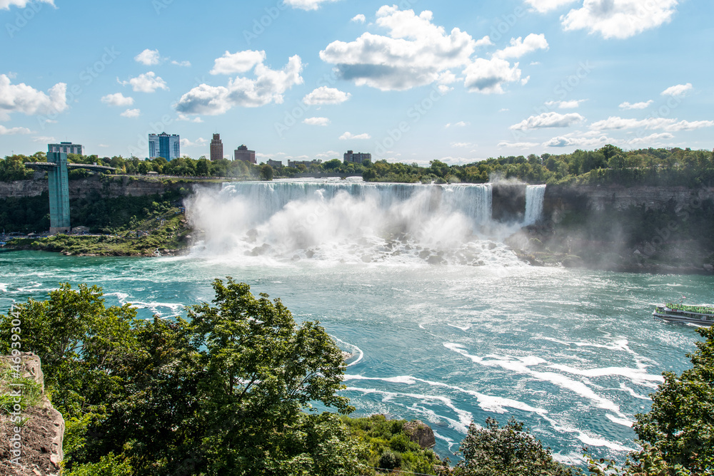 Famous Niagara Falls on a sunny day from Canadian side Famous Niagara Falls on a sunny day from Canadian side