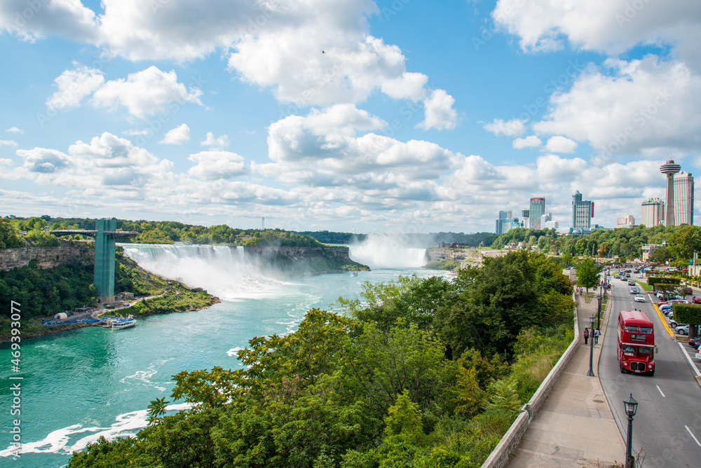 Famous Niagara Falls on a sunny day from Canadian side Famous Niagara Falls on a sunny day from Canadian side