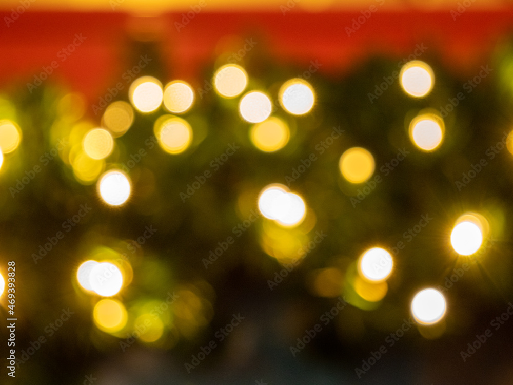 Blur Christmas and New Year decorations. Blurred background of burning garlands.