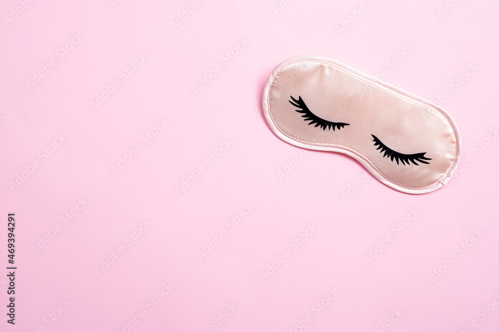 Sleeping mask on pink background. Sleeping mask on pink background.