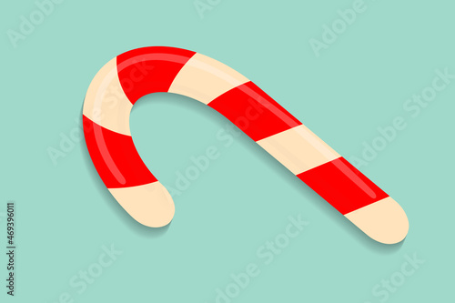Traditional Christmas candy cane on blue background. Red and white Xmas lollipop flat vector illustration