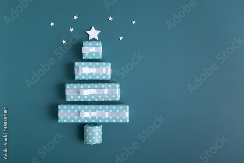 Blank greeting card with abstract Christmas tree made of gift boxes for Merry Christmas and New Year