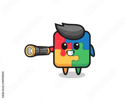 puzzle mascot holding flashlight