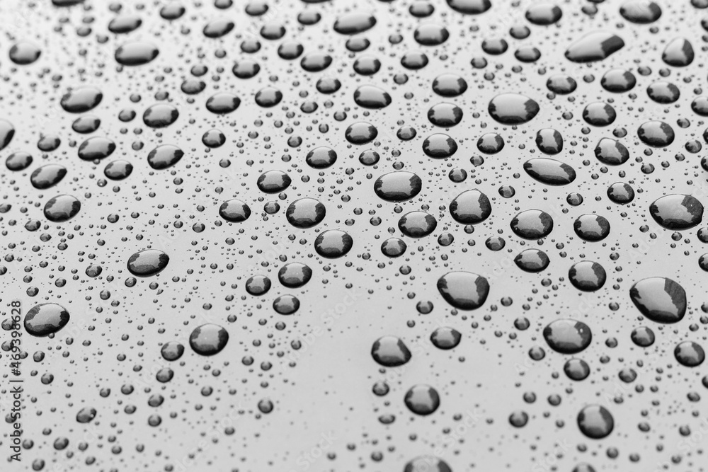 Pattern of water drops in a shining metallic surface with sky reflections,Water droplet on the car hood. Realistic pure water droplet water drops for creative banner design Pattern of water drops in a shining metallic surface with sky reflections,Water droplet on the car hood. Realistic pure water droplet water drops for creative banner design