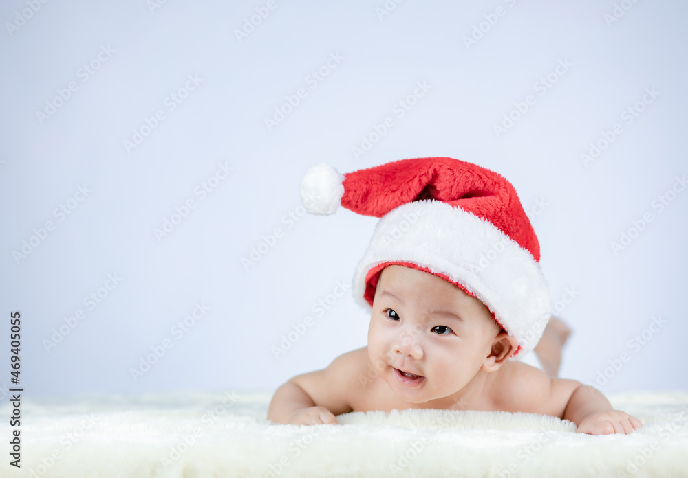 Christmas portrait of cute little Baby wearing santa hat. Christmas portrait of cute little Baby wearing santa hat.