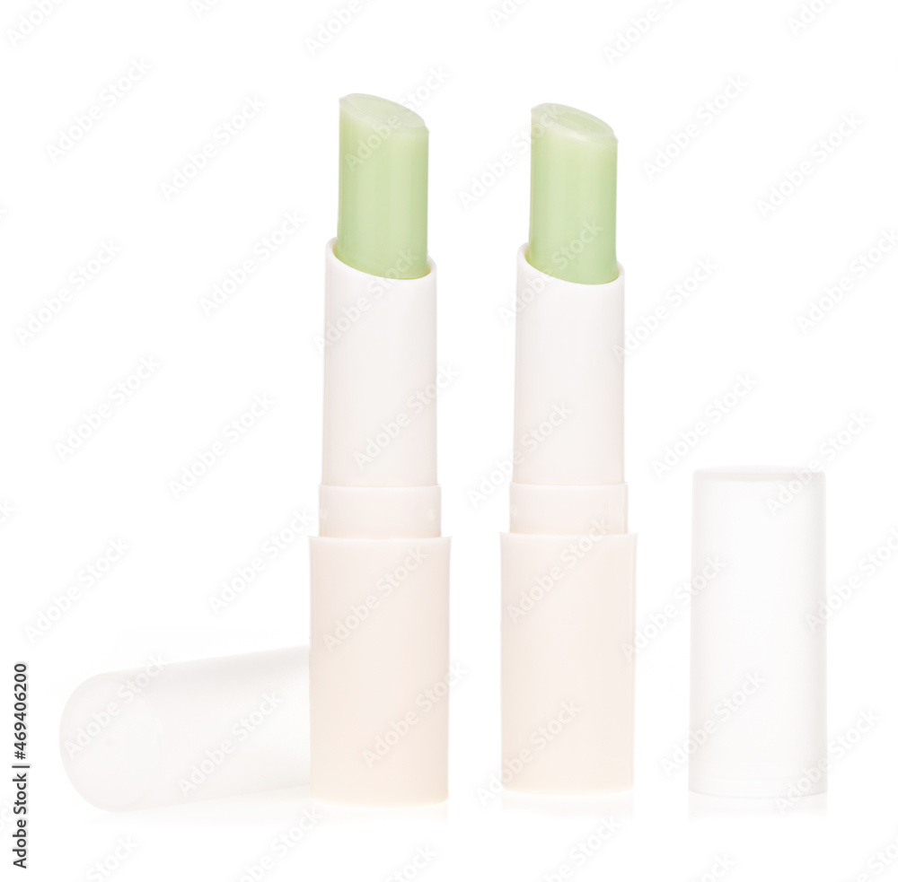 Set of Glossy lip balm stick isolated on a white background. Set of Glossy lip balm stick isolated on a white background.