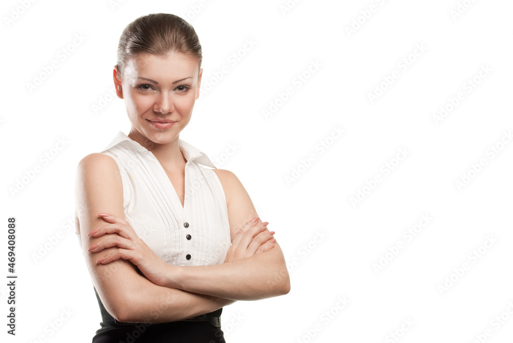 Portrait of a happy young business woman standing with folded hand against white background Portrait of a happy young business woman standing with folded hand against white background