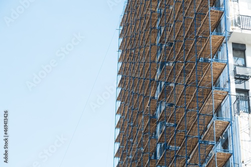 The architectural complex of residential buildings on sky background