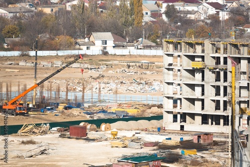 The architectural complex of residential buildings on sky background
