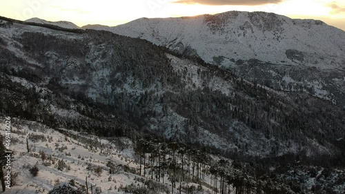 Aerial view of the snowy mountain Taygetus (also known as Taugetus or Taygetos) above Messenia unit in Peloponnese, Greece. Amazing natural scenery of the highest mountain in Peloponnese during winter photo